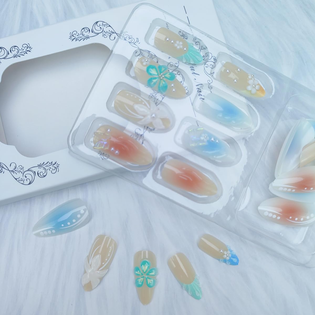 24Pcs Summer Press on Nails Medium Almond Fake Nails French Tip False Nails with Flower Butterfly Design Glossy Blue Gradient Acrylic Nails Beach Stick on Nails 3D Water Ripple Glue on Nails for Women