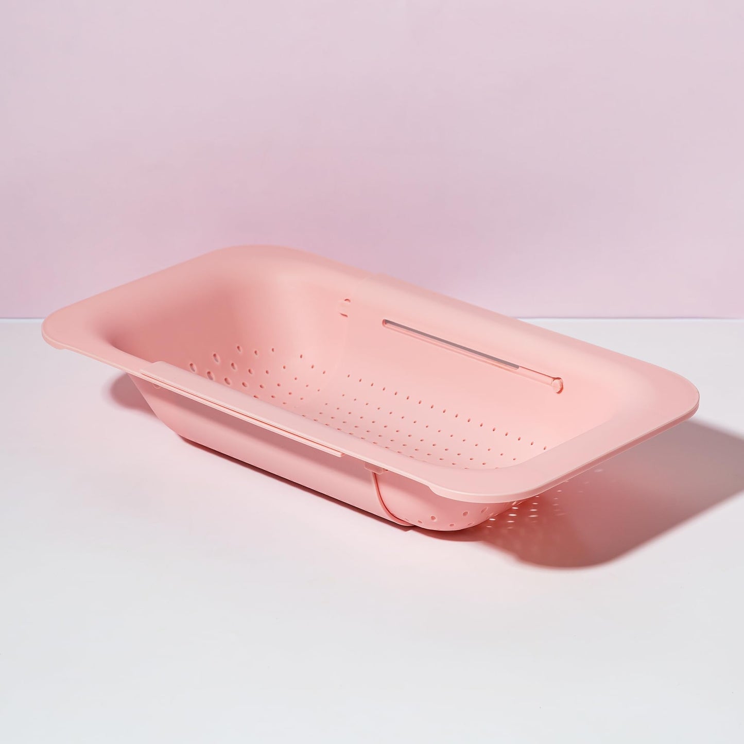 Paris Hilton Over the Sink Expandable Colander, Extendable Strainer, Adjustable from 14.5 inches to 19.5 inches, Fits most kitchen sinks, Made without BPA, Pink