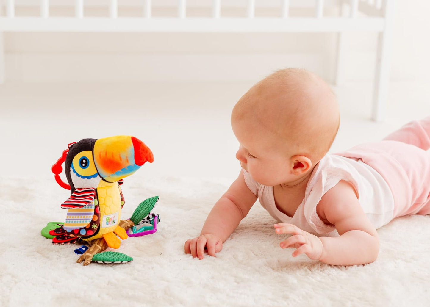 Balibazoo Toucan Hanging Baby Toy – Soft Plush Sensory Rattle with Crinkle Wings, Hidden Bell & BPA-Free Teether | Clip Attaches to Stroller, Car Seat, Gym | Developmental Toy for Babies 0-24M