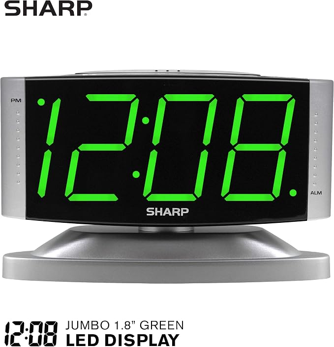 Sharp Digital Alarm Clock with Swivel Base, Green LED, Dimmer, Silver | Large green LED digits; Adjustable swivel base; Brightness dimmer; Snooze alarm; Simple controls; Silver case