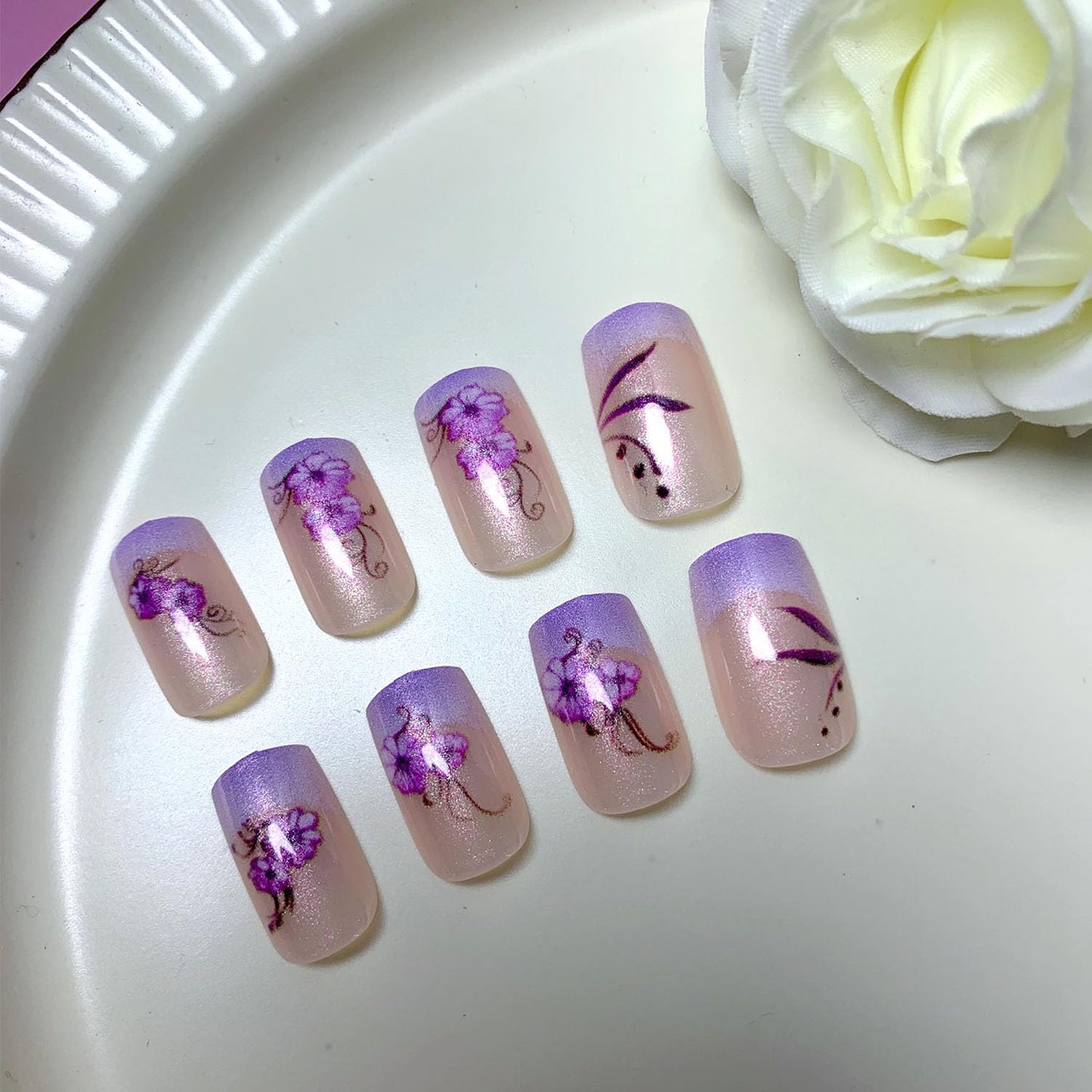 French Press on Nails Medium Short Fake Nails with Glitter Designs Purple Flowers Glue on Nails Translucent Nails Press ons Spring False Nails for Women 24 Pcs
