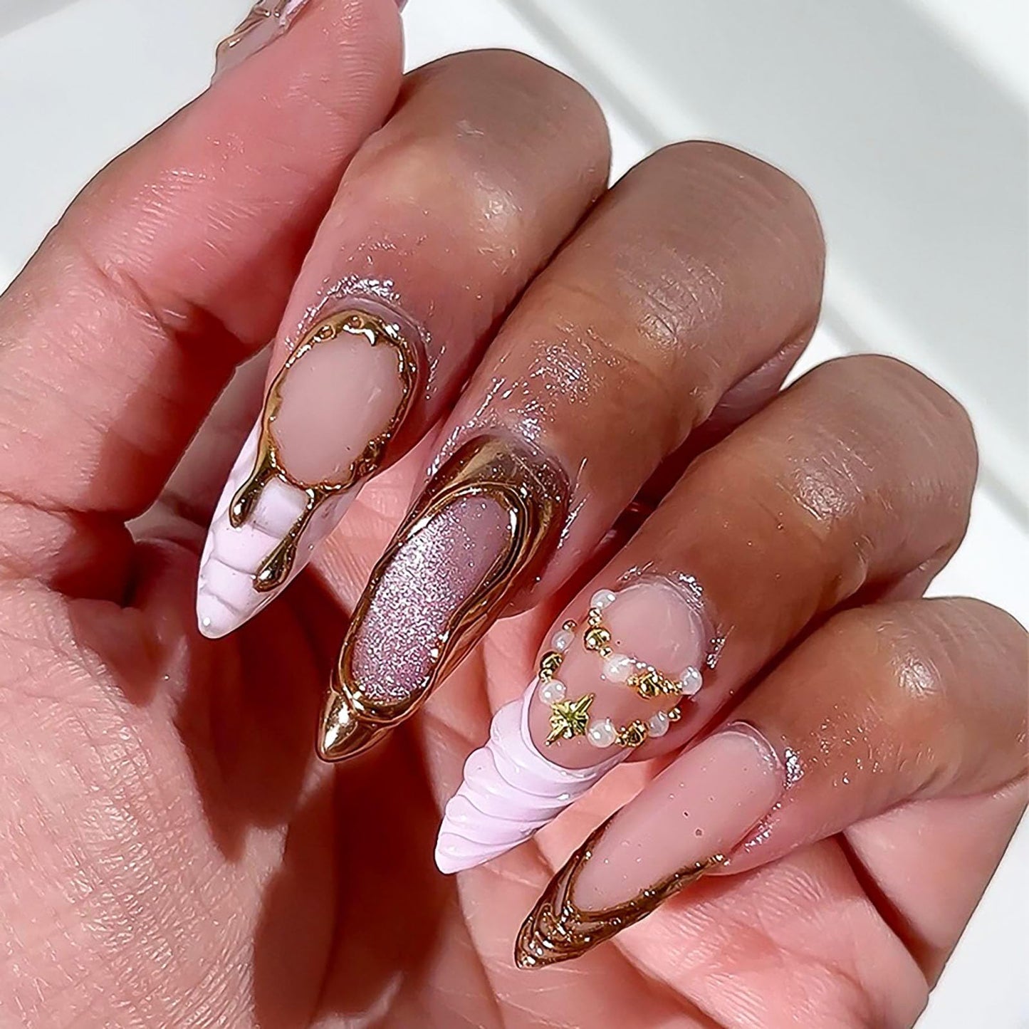 RUOKEXIN Long Stiletto Press on Nails French Tip Fake Nails Pink False Nails with Gold 3D Designs VAlmond Nail Press ons Sparkly Artificial Nails for Women 24Pcs