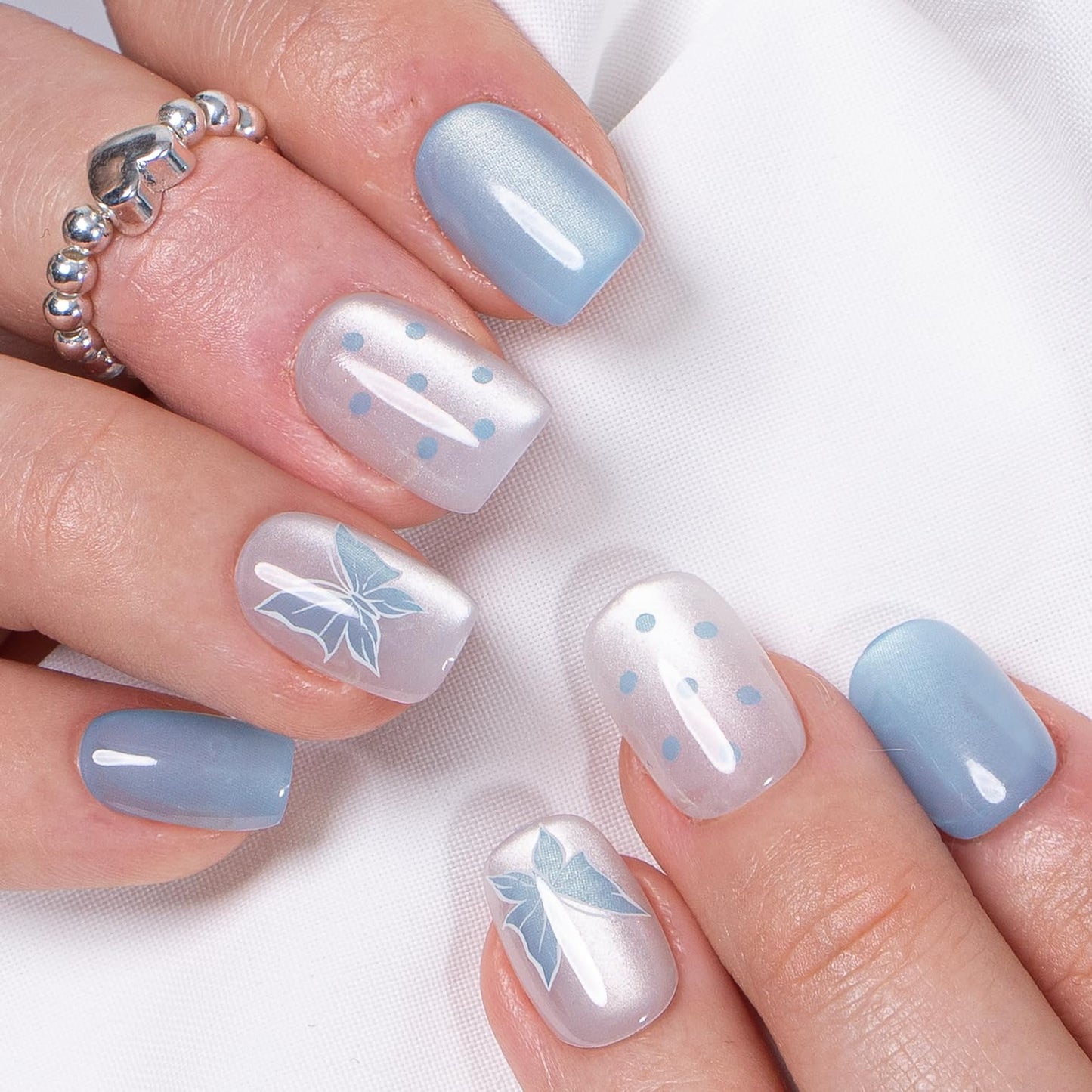 CurvLife Press on Nails Short Square Acrylic Fake Nails with Apricot Design Full Cover False Nails Glossy Nude Glue on Nails Artificial Stick on Nails for Women (Blue Flutter)