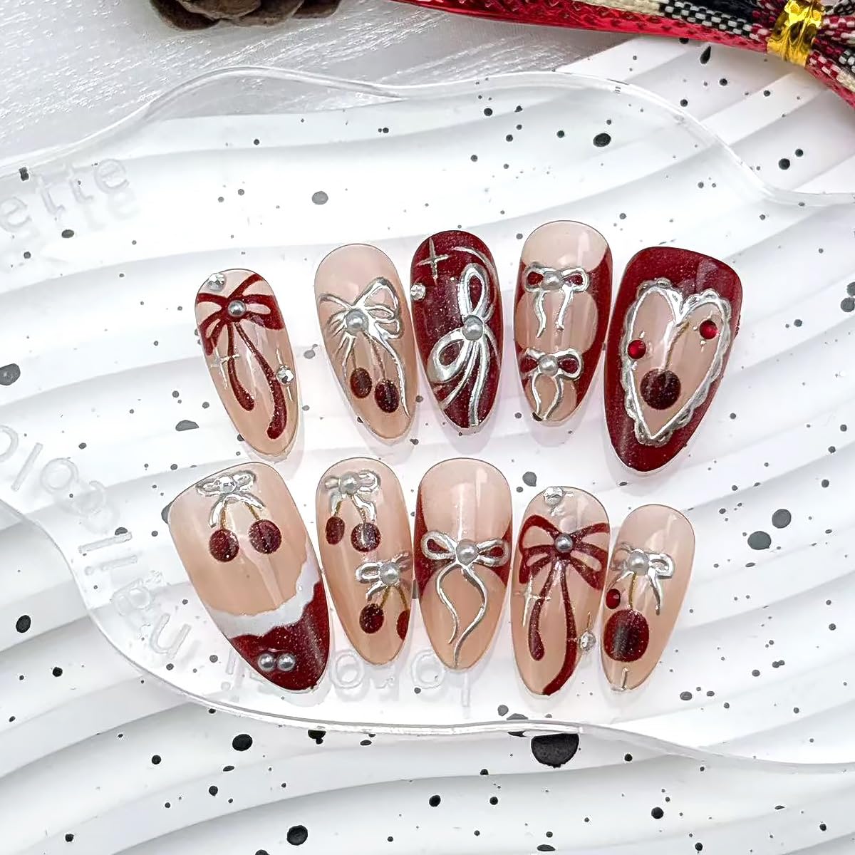 30Pcs Cherry Press on Nails Medium Almond Fake Nails Red French Tip False Nails with 3D Cherry Pearl Gems Design Silvering Bow Star Glue on Nails Full Cover Artificial Stick on Nail for Women Manicure