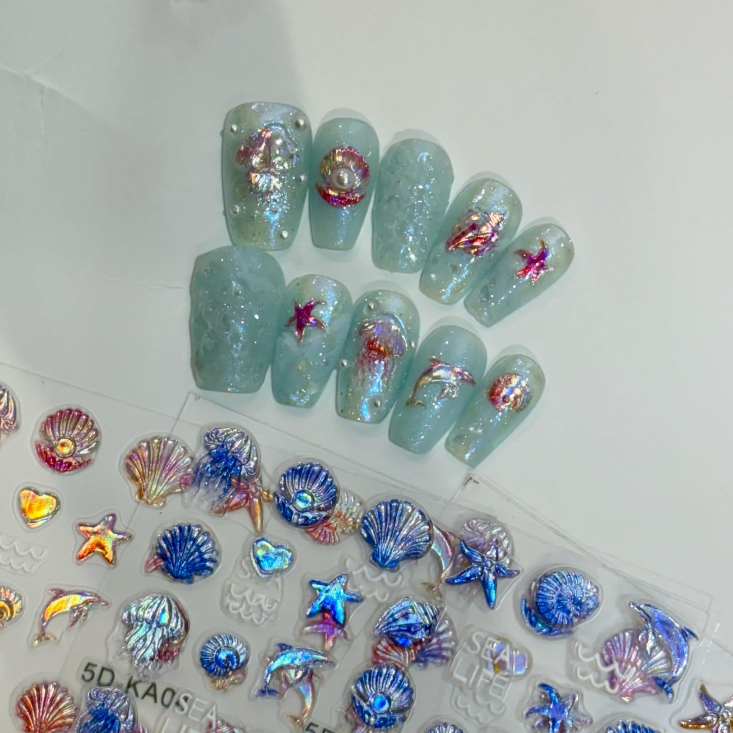 SIMAYKUWA 5D Nail Art Stickers - 3D Shell Octopus Relief Design with Shimmer Glitter for DIY Manicure, Ocean Theme False Nail Decorations A Set of 3 Sheets