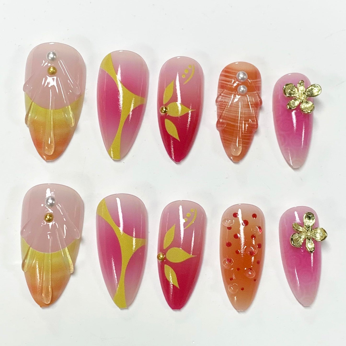 BABALAL Press On Nails, Medium Almond Fake Nails, Sunset Orange Pink Marble with Gold Flower Charm, Glossy Summer Tropical Glue On Nails for Women and Girls 24Pcs Reusable