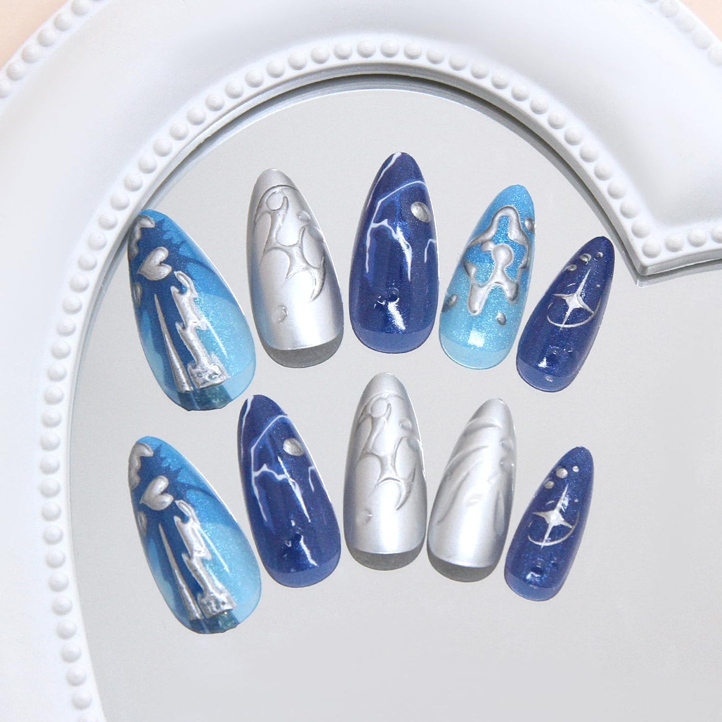 24Pcs Dark Blue Press on Nails Medium Almond Fake Nails with 3D Ripple Irregular Silver Line Star Design Glossy French Nails Tip Stick on Nails Full Cover Artificial Glue on on Nails for Women