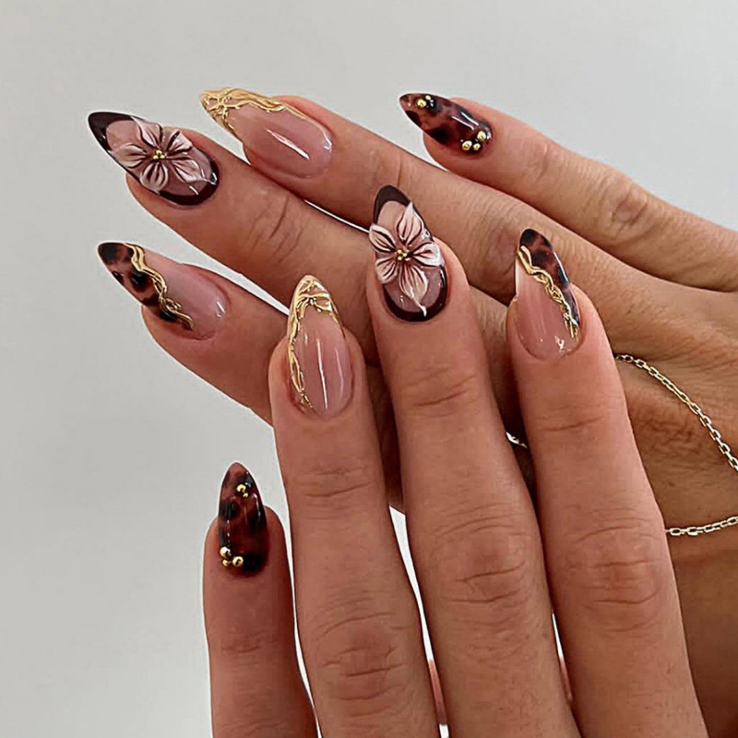 SEENEEY Almond Press on Nails Medium Fake Nails Brown Artificial Nail Floral and Gold Charm Designs Stick on Nail for Women 24pcs