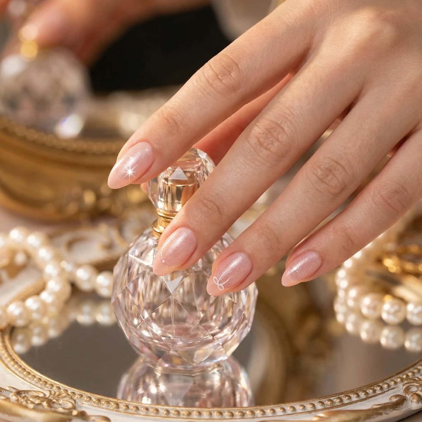 French Press on Nails Short Almond Fake Nails Pink with Bow Starlight Designs Full Cover Acrylic Glue on Nails Removable Artificial Stick on Nails for Women 24 Pcs