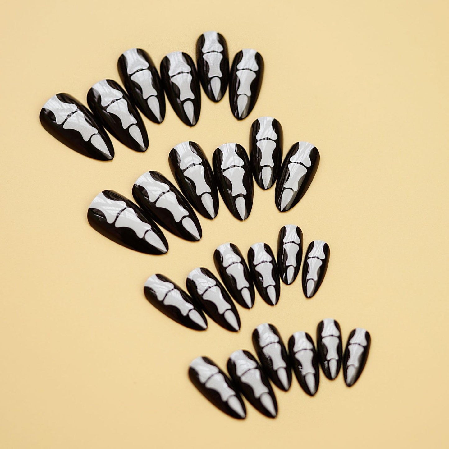 Halloween Press on Nails Medium Almond Fake Nails Horror Finger Bone Designs Acrylic Nails Black False Nails Press ons Glossy Glue on Nails Full Cover Stick on Nails for Women Girls 24Pcs