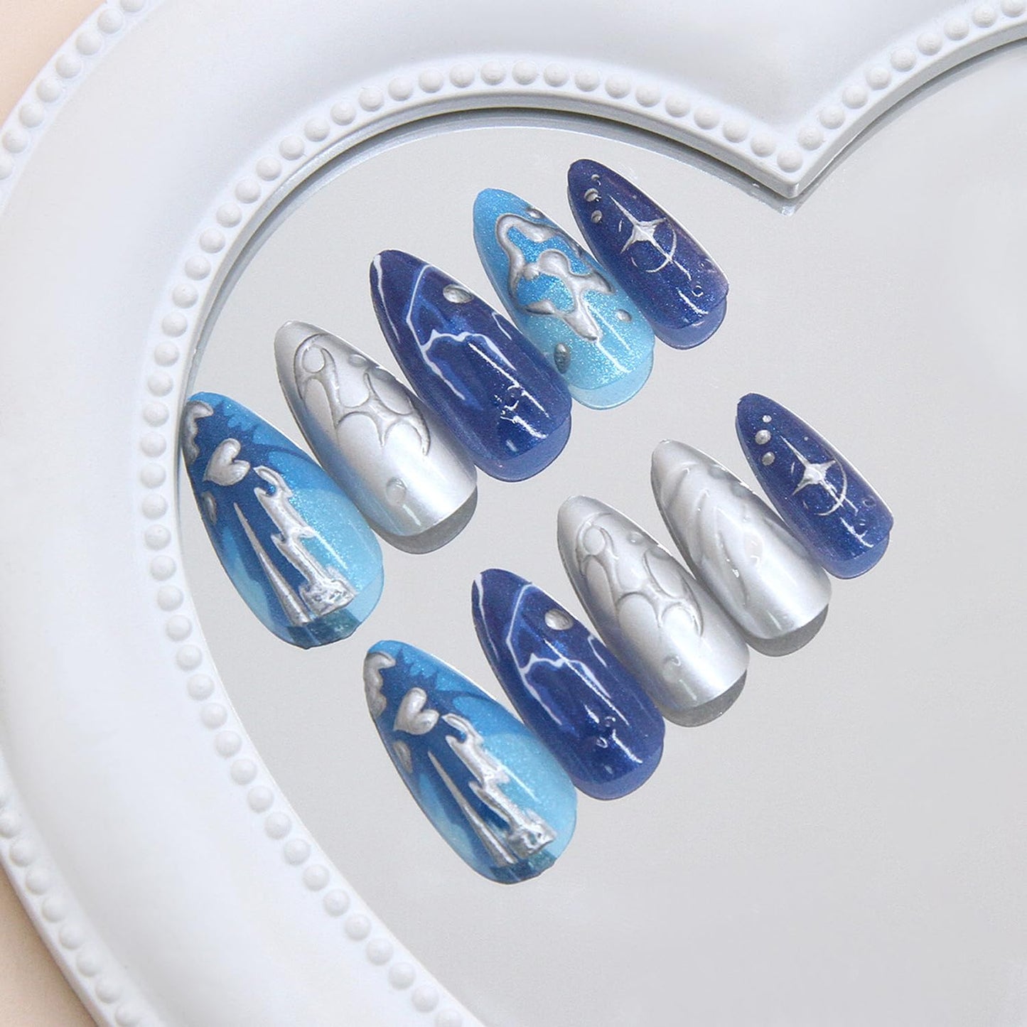 24Pcs Dark Blue Press on Nails Medium Almond Fake Nails with 3D Ripple Irregular Silver Line Star Design Glossy French Nails Tip Stick on Nails Full Cover Artificial Glue on on Nails for Women