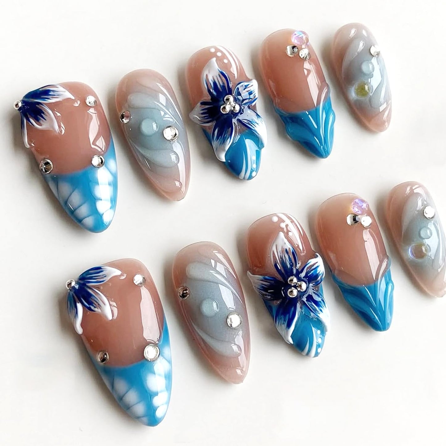 Nude Blue Ocean Press on Nails, Medium Almond Handmade 3D Flower Fake Nails with Rhinestone Designs,Glossy Reusable False Nails with Glue Tabs for Summer Vacation 30Pcs Nail Kit for Women