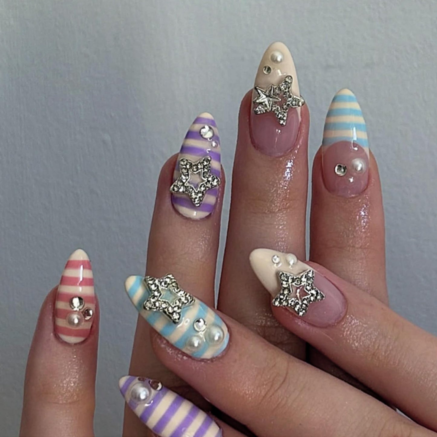 octoswave Press on Nails Long Almond Fake Nails French Artificial Nail Stripes Designs with 3D Stars Stick on Nail for Women 24pcs