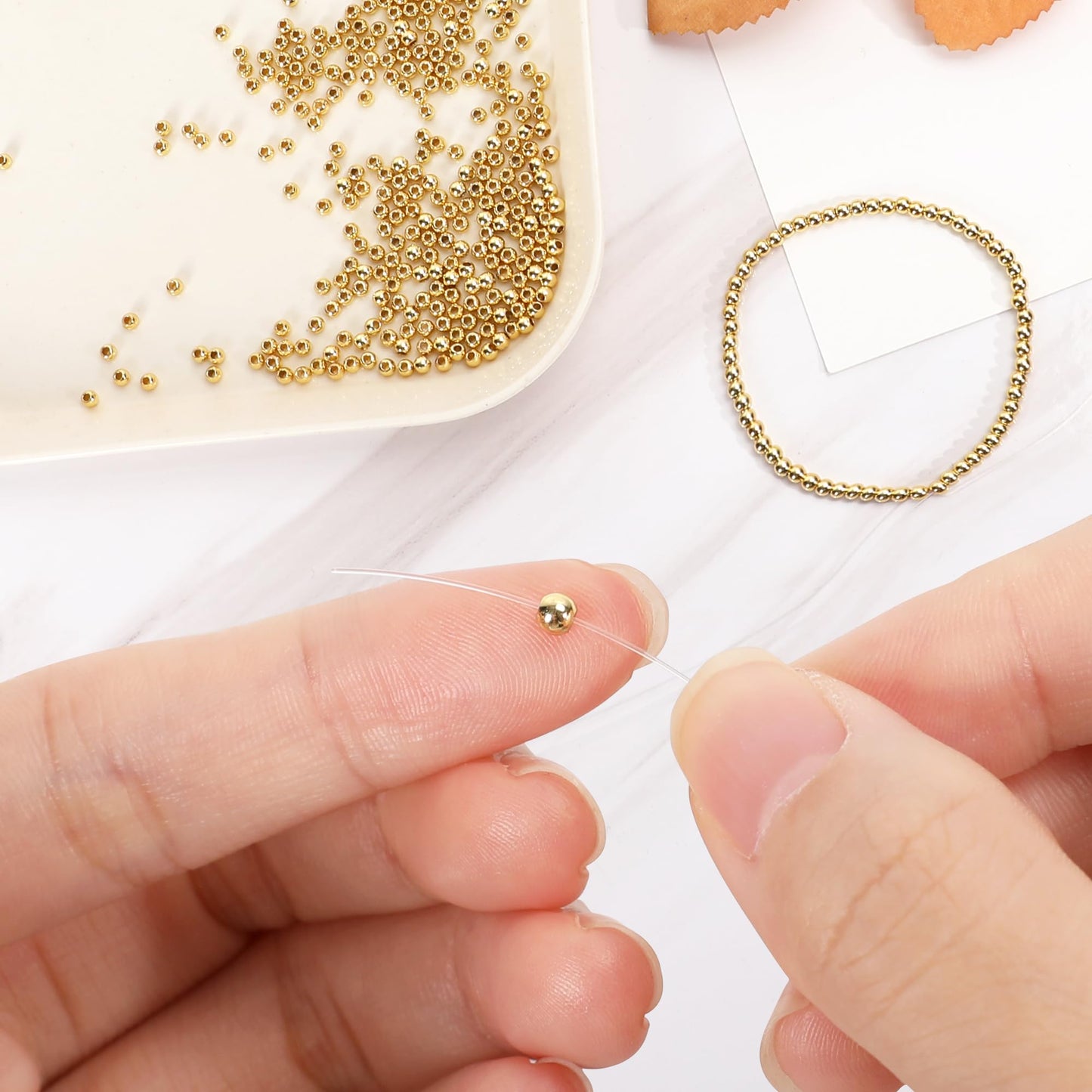 600pcs 2mm 18K Gold Filled Spacer Beads for Bracelets, Necklace, Earring - Seamless Tiny Small Gold Round Spacer Beads for Jewelry Making DIY Bulk Supply