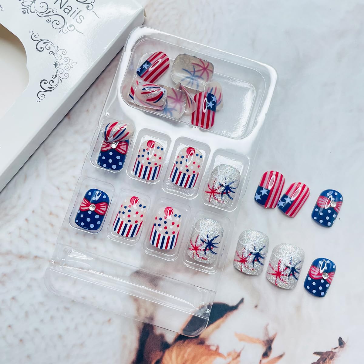 4th of July Press on Nails Short Square Fake Nails with American Flag Glitter Fireworks Designs Independence Day False Nails Polka Dot Stripe Bow Cute Artificial Glue on Nails for Women Girls 24Pcs