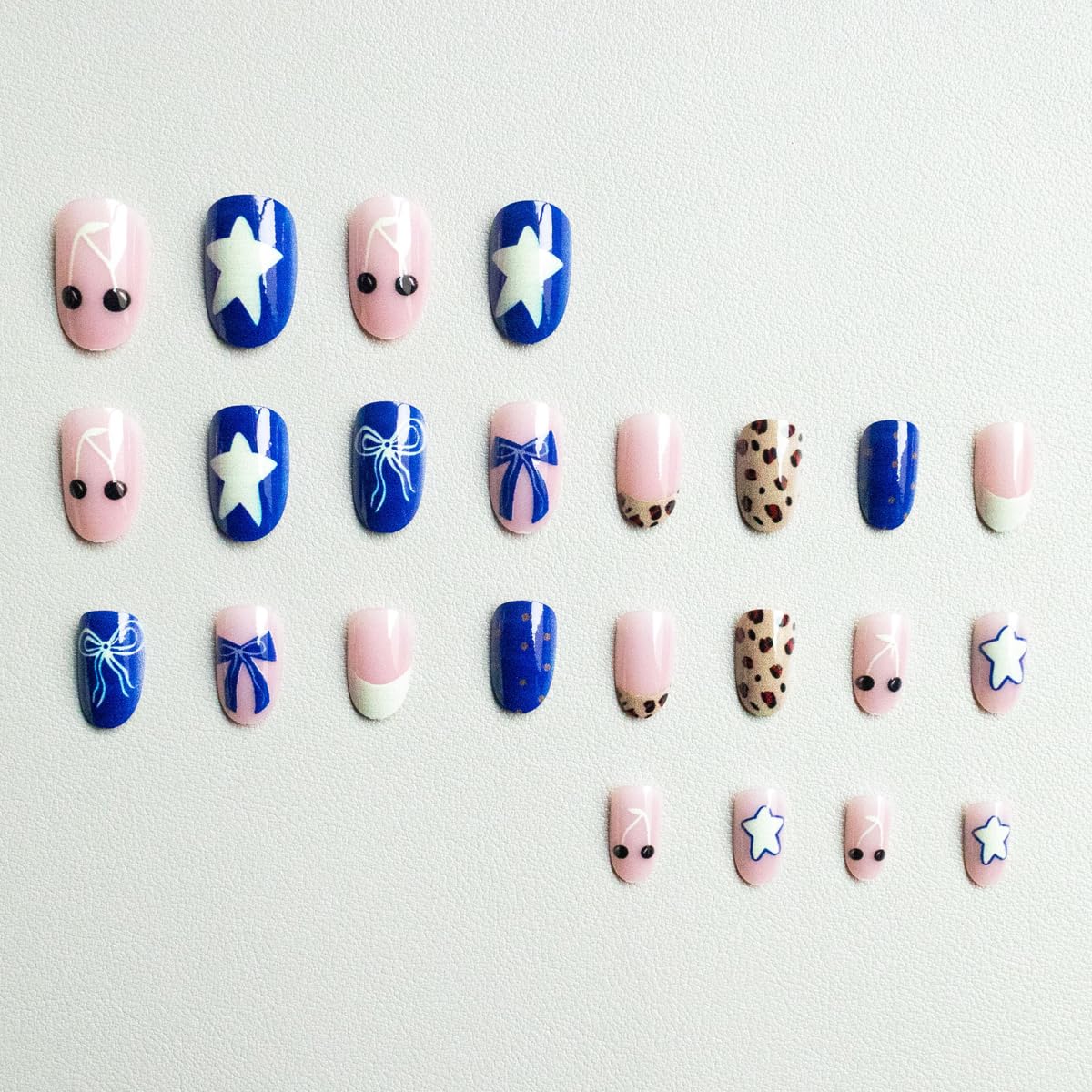 Blue Press on Nails Medium Oval Fake Nails French tip Nails Press ons with Polka Dot, Leopard, Star Design,Cute Reusable Artificial Nail Full Cover Stick on Nails for Women Manicure 24Pcs