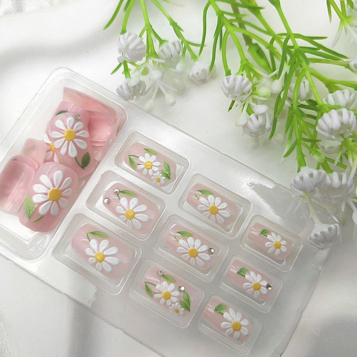 Square Press on Nails Medium Fake Nails with White Flower Green Leaves Rhinestones Designs Glossy Glue on Nails Nude Nails Press ons Summer Acrylic Artificial Stick on Nails for Women 24Pcs