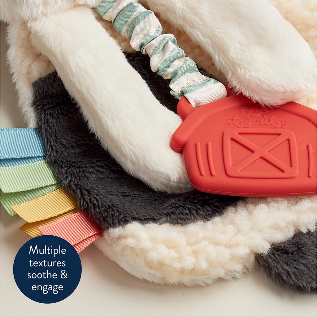 Itzy Ritzy - Itzy Lovey Including Teether - Baby Lovey with Teether, Textured Ribbons & Dangle Arms - Features Crinkle Sound, Sherpa Fabric and Minky Plush (Cow)