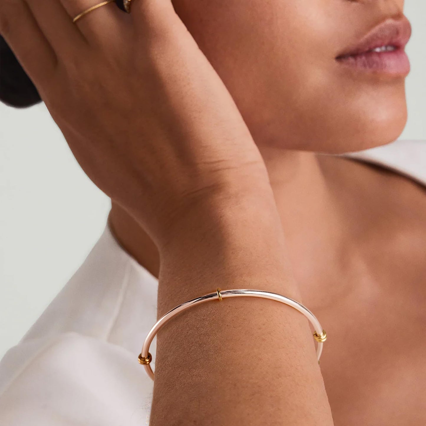 NOKMIT Two-Tone Stackable Bangle for Women High Polished Thin Interlocking Stainless Steel Bracelets Classic Plain Non-Tarnish Gold&Silver Mixed Metal 1PC/3PCS (1pc, 7.5inch)