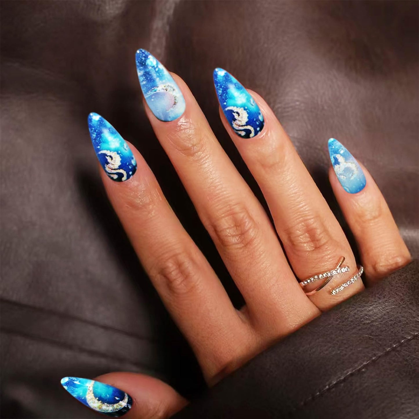 24Pcs Moon Press ons Fingernails Starry Sky Gel Glue on Acrylic Fake Nails Milky Way Press on Nails Glossy Blue Gradient Medium Almond False Nail Sea Horse Stick on Nail for Holiday Manicure Art