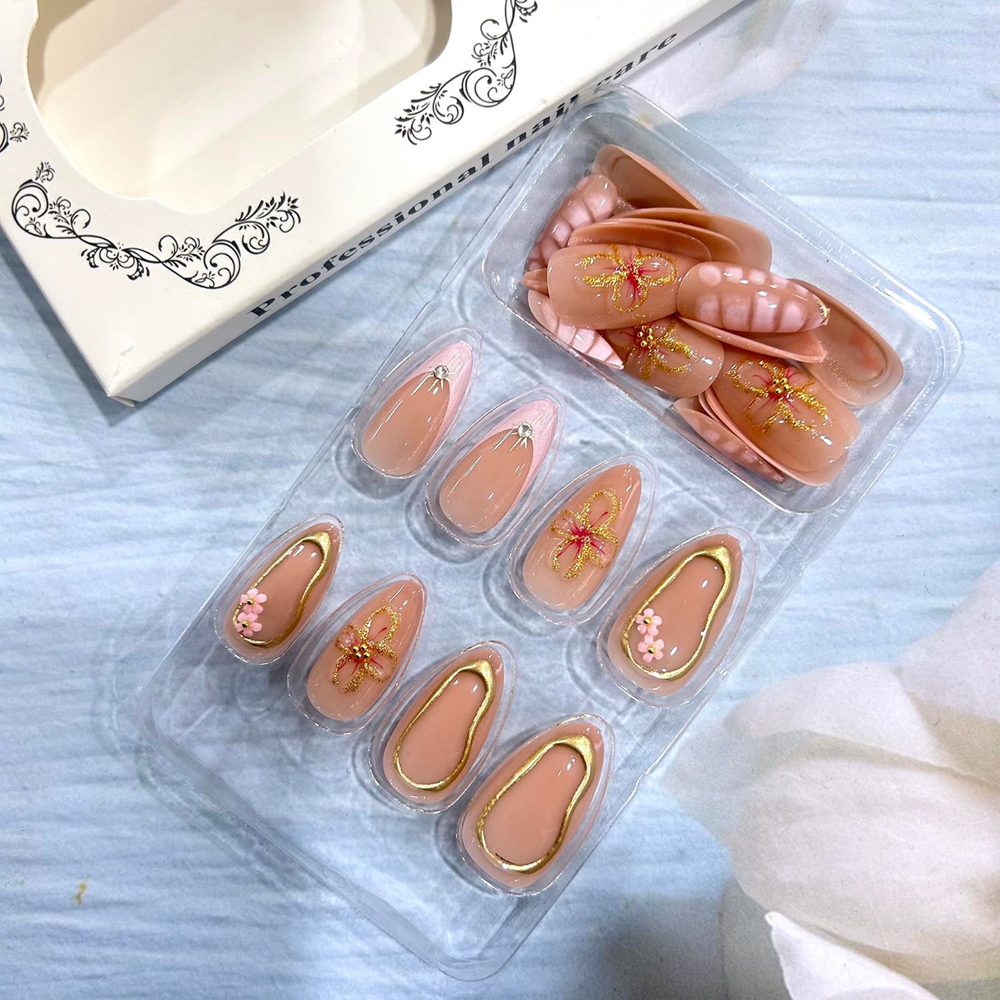 CJDLTS Flower 3D Pink Press on Nails Medium Almond Shaped French Tip False Nails Gold Lines Crocodile Pattern Design Full Cover Artificial Acrylic Nail Reusable Glue on Nails for Women 24Pcs