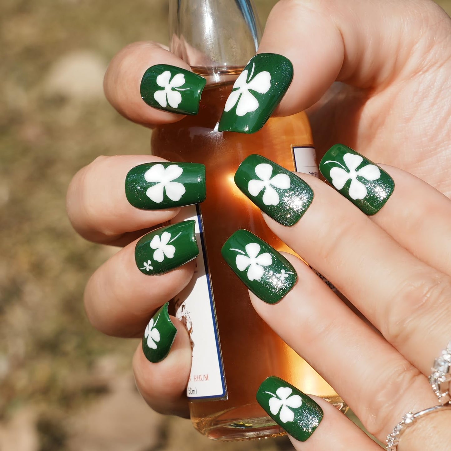Tesytto Medium Square Press On Nails Acrylic Green Fake Nails with Silver Glitter Design & White Clover Print, Stick on Nails for Women (Size L)