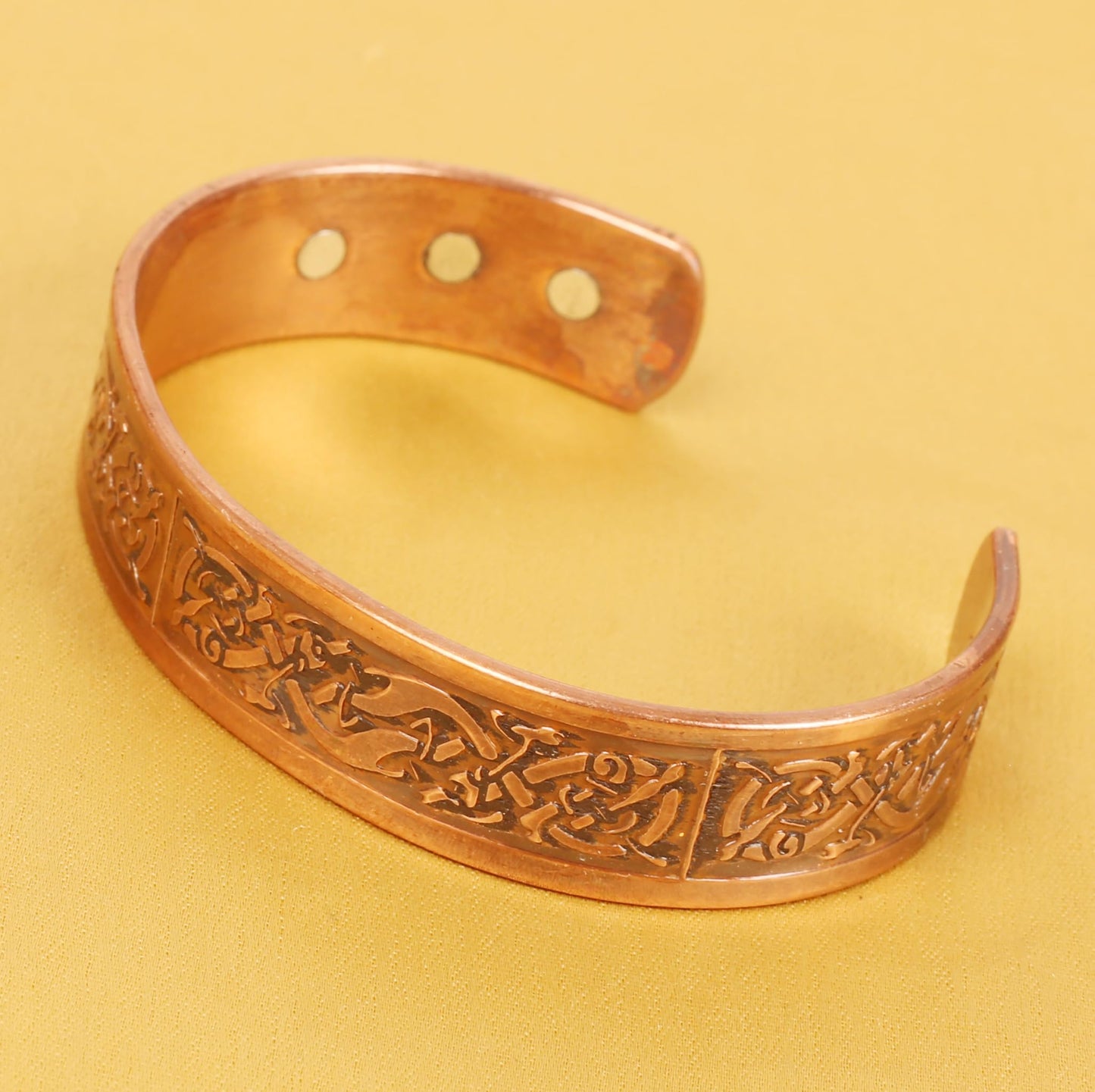 Touchstone handcrafted magnetic copper bracelet. Hand forged with solid and high gauge Tibetan style engraved cuff pure copper jewelry for women men. Exclusive Celtic Design.