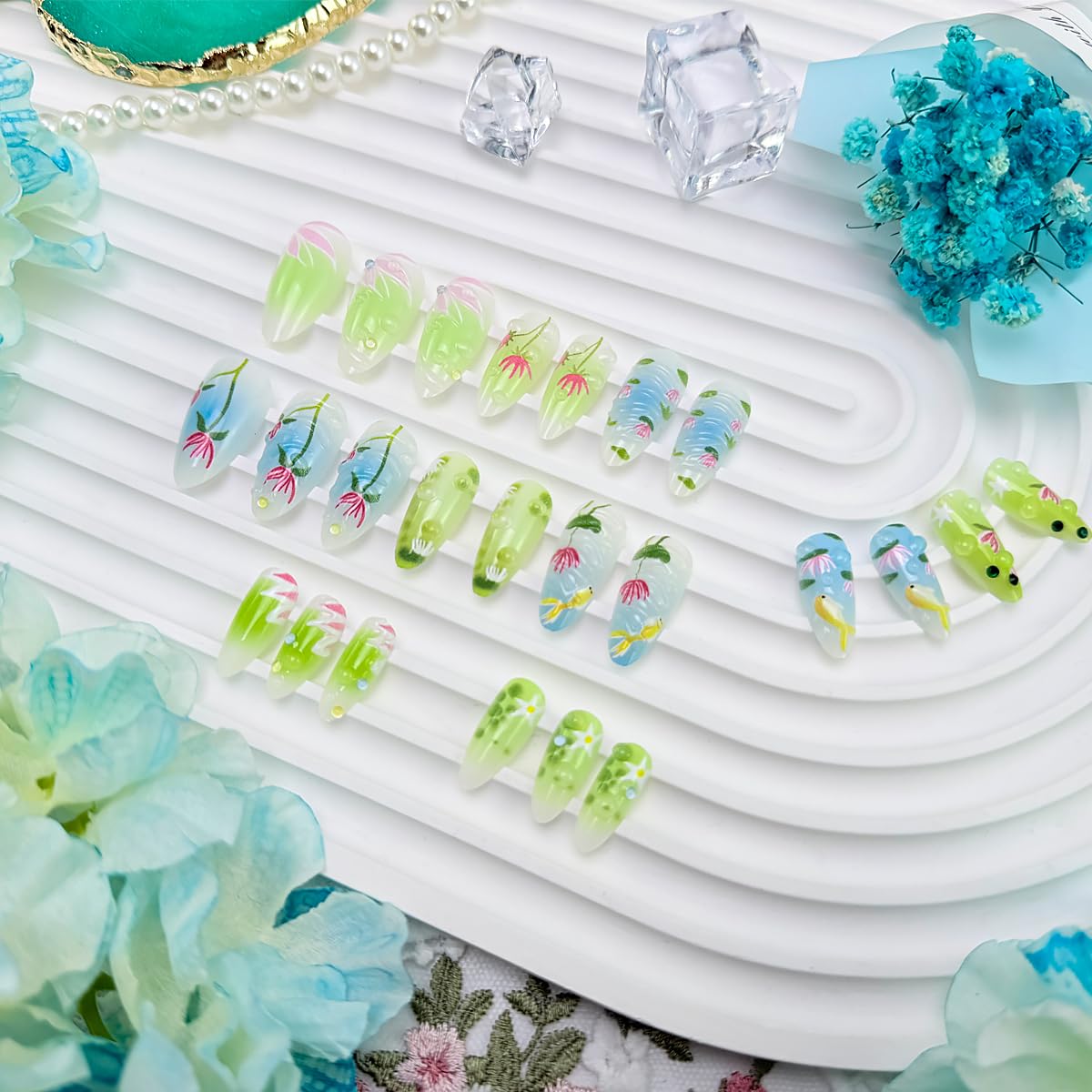 NEWSPIED Medium Almond Press on Nails Spring Summer Fake Nails with 3D Floral Koi Fish Lotus Designs Glossy Blue Green False Nails Cute Full Cover Artificial Acrylic Nails for Women DIY 24Pcs