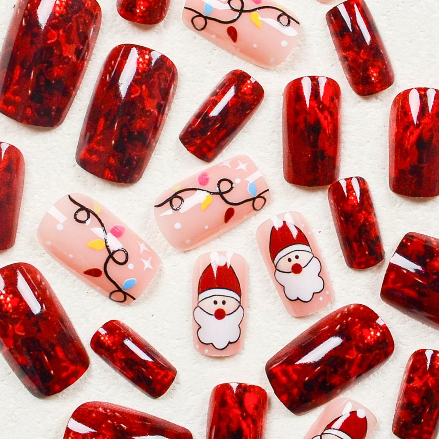 IMSOHOT Press on Nails Short Square Fake Nails Red Shiny False Nails with Santa Pattern Designs Cute Glossy Full Cover Glue on Nails for Women Girls 24Pcs