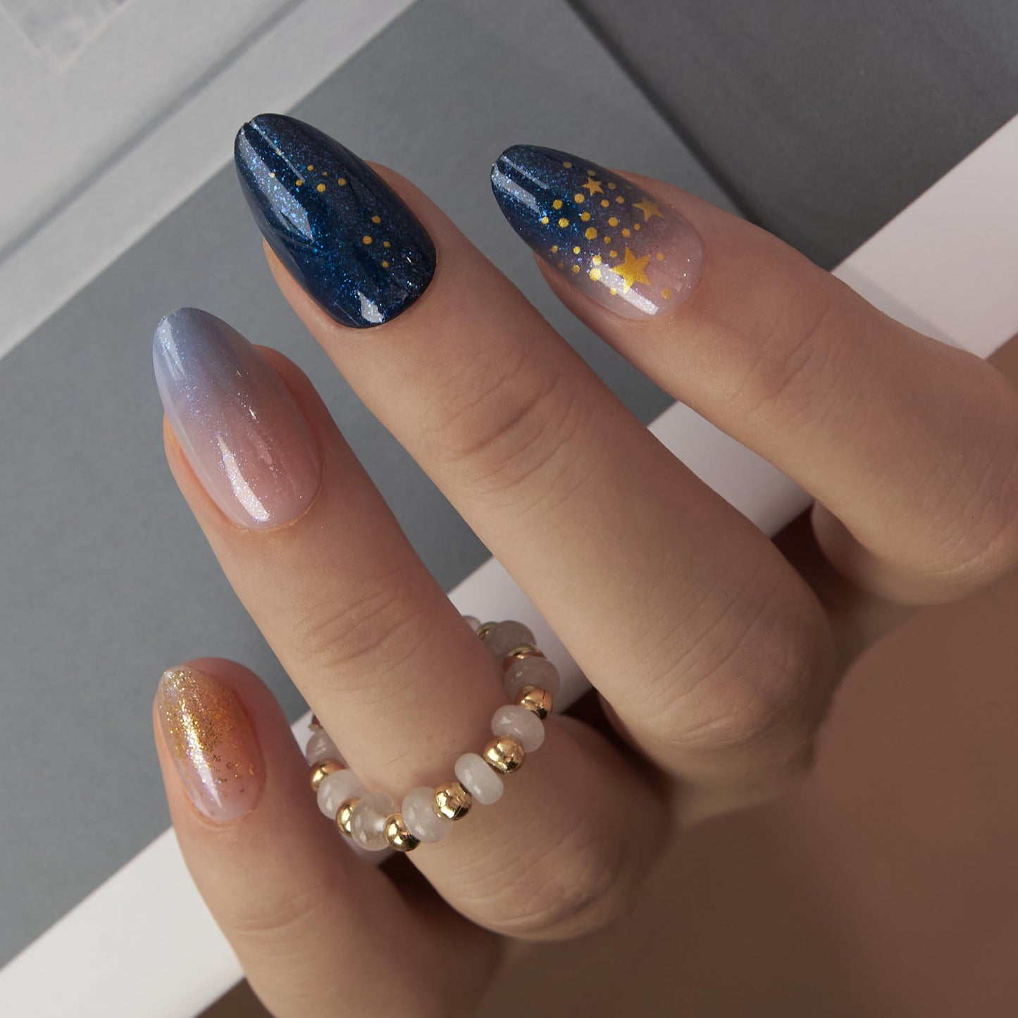 Curvlife 30pcs Press on Nails, Acrylic Fake Nail with Apricot Design, Full Cover False Nails Tips Glossy Nude Glue on Nails Artificial Stick on Nails for Women (starry night glitter nails, Medium)