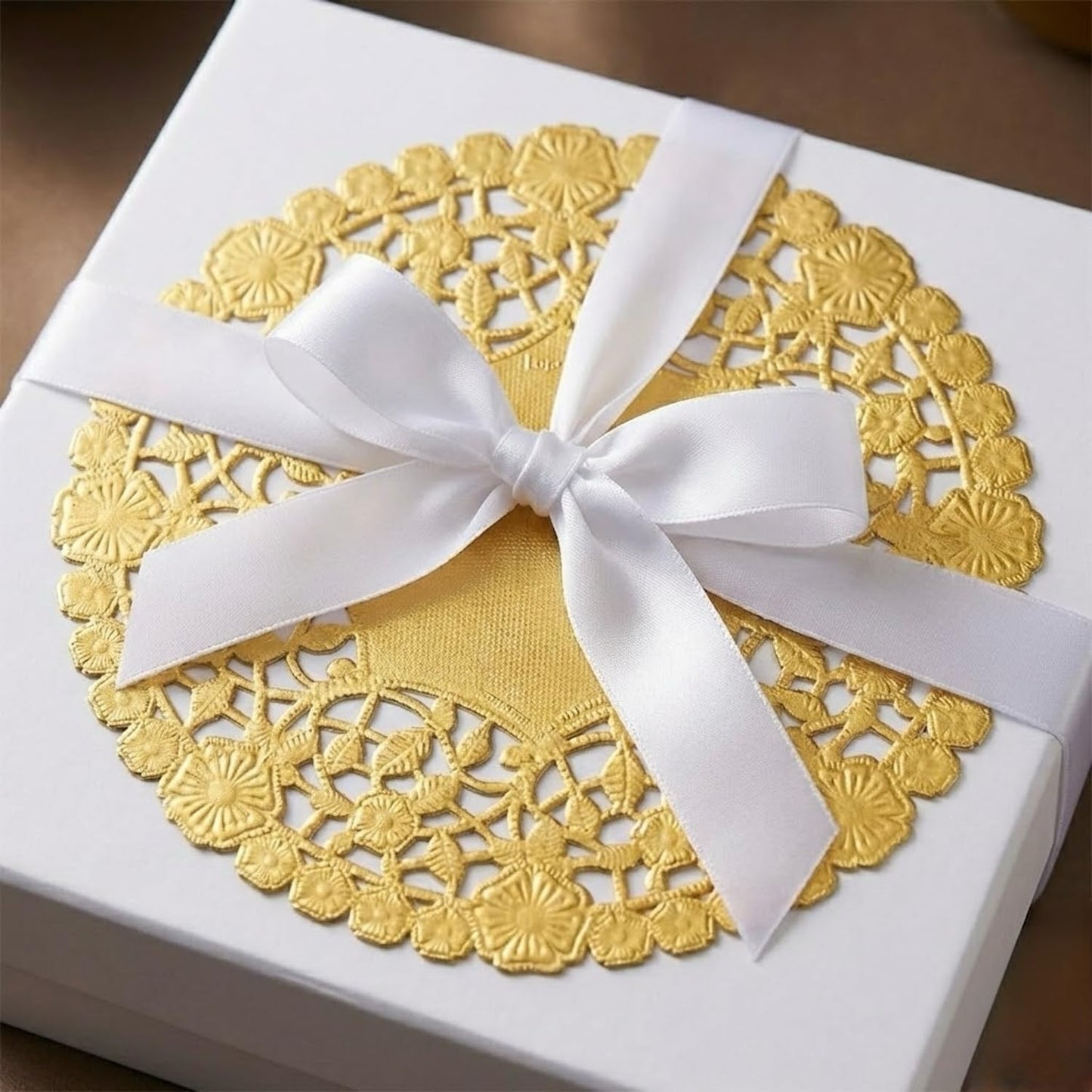 The Baker Celebrations Gold Foil 6-Inch Paper Lace Doilies – 100-Pack Decorative Round Placemats for Table Setting, Baking, Crafts – Made in Canada