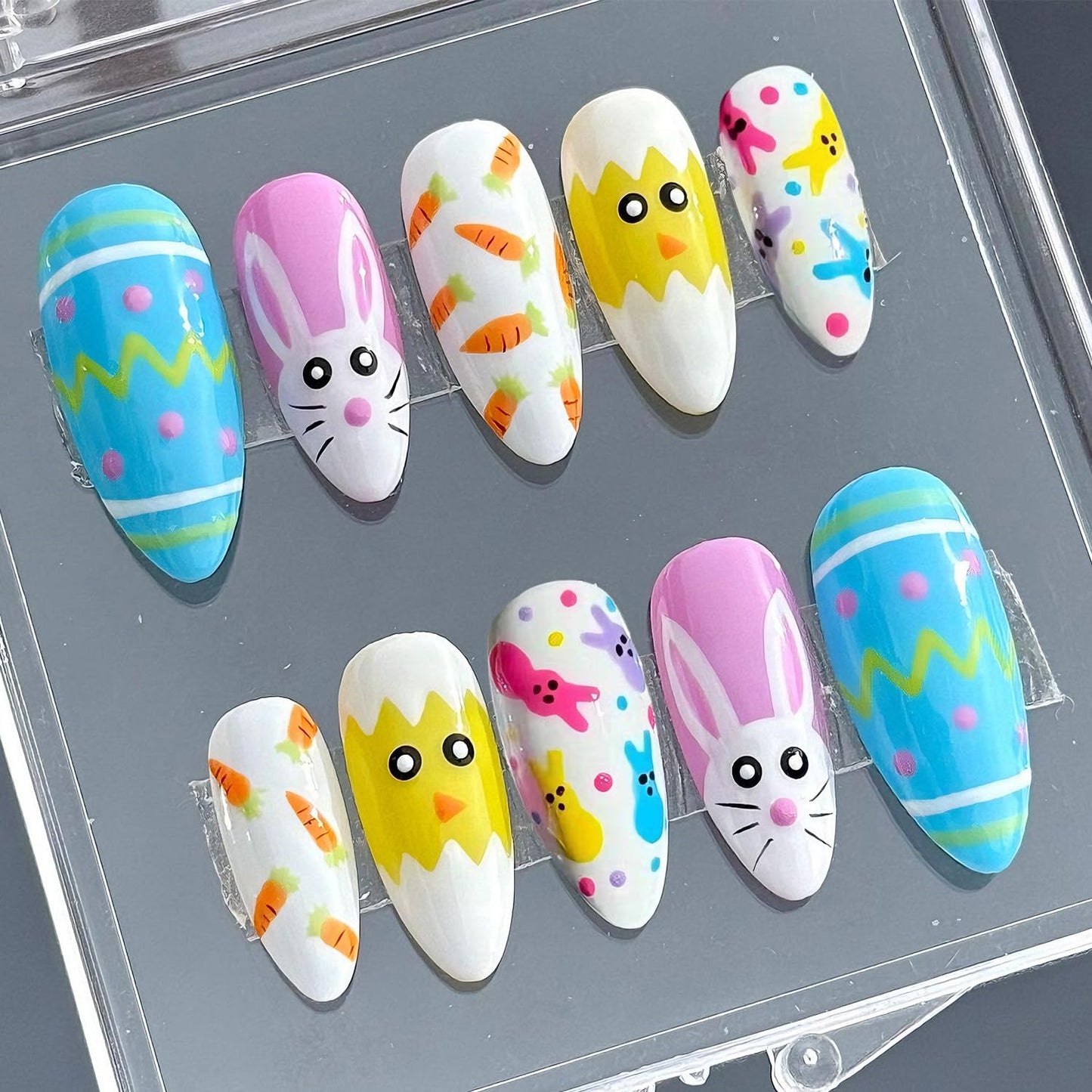 24Pcs Easter Press on Nails Medium Almond Fake Nails with Designs Cute Chick Carrot Bunny False Nails Easter Egg Acrylic Nail Cartoon Rabbit Full Cover Glue on Nails for Women Holiday Nail Decor