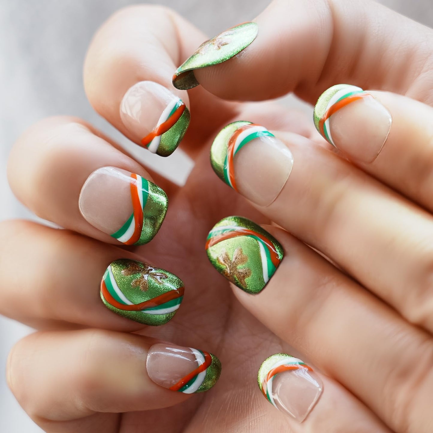 Tesytto Short Round Press On Nails, Green Glitter with Multicolor Line & Gold Clover Accents, Handmade Reusable Full Cover Nail Art (Size M)