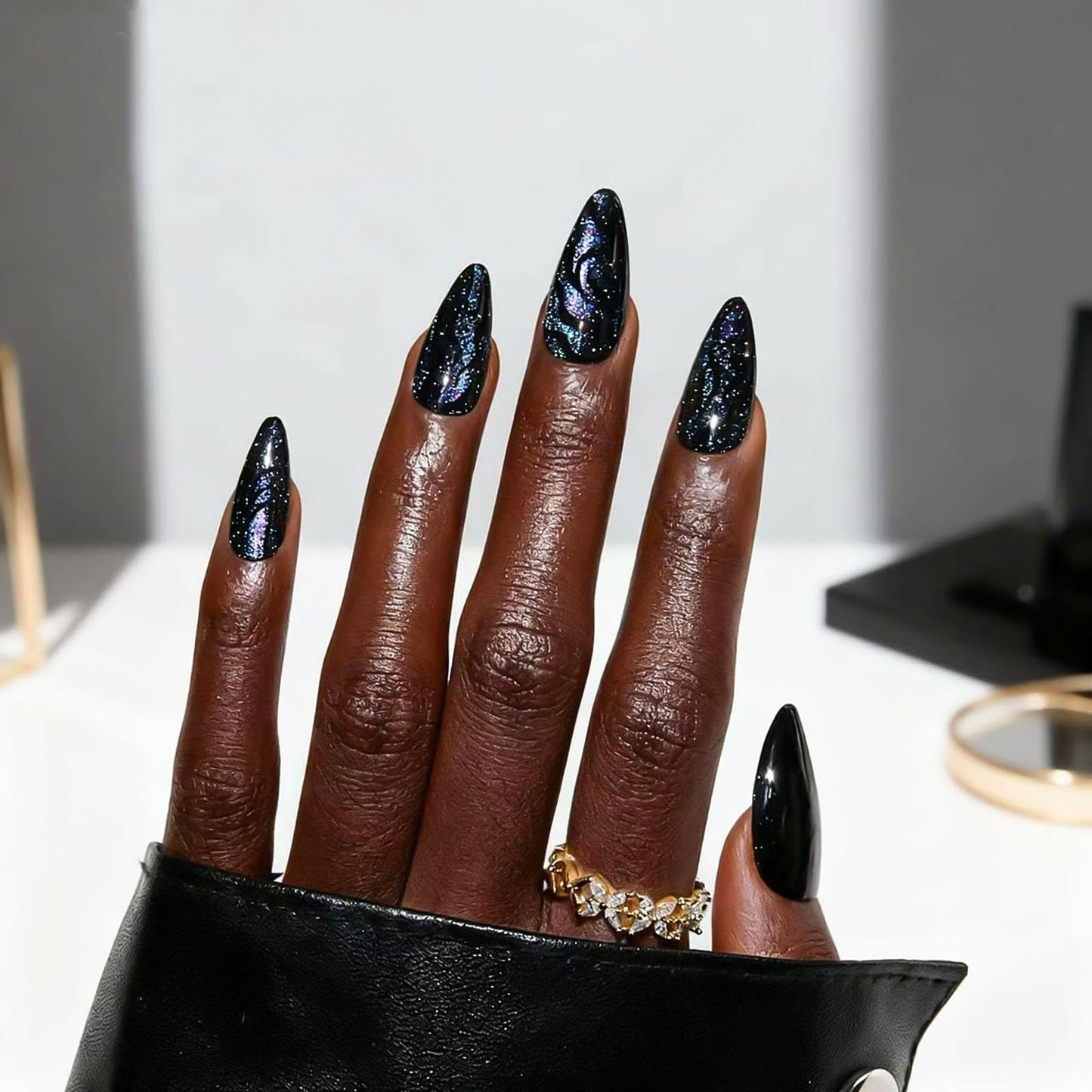 RUOKEXIN Almond Press on Nails Medium Length Fake Nails Black Cat Eye False Nails with Designs Glitter Nail Press ons Sparkly Artificial Nails for Women 24Pcs