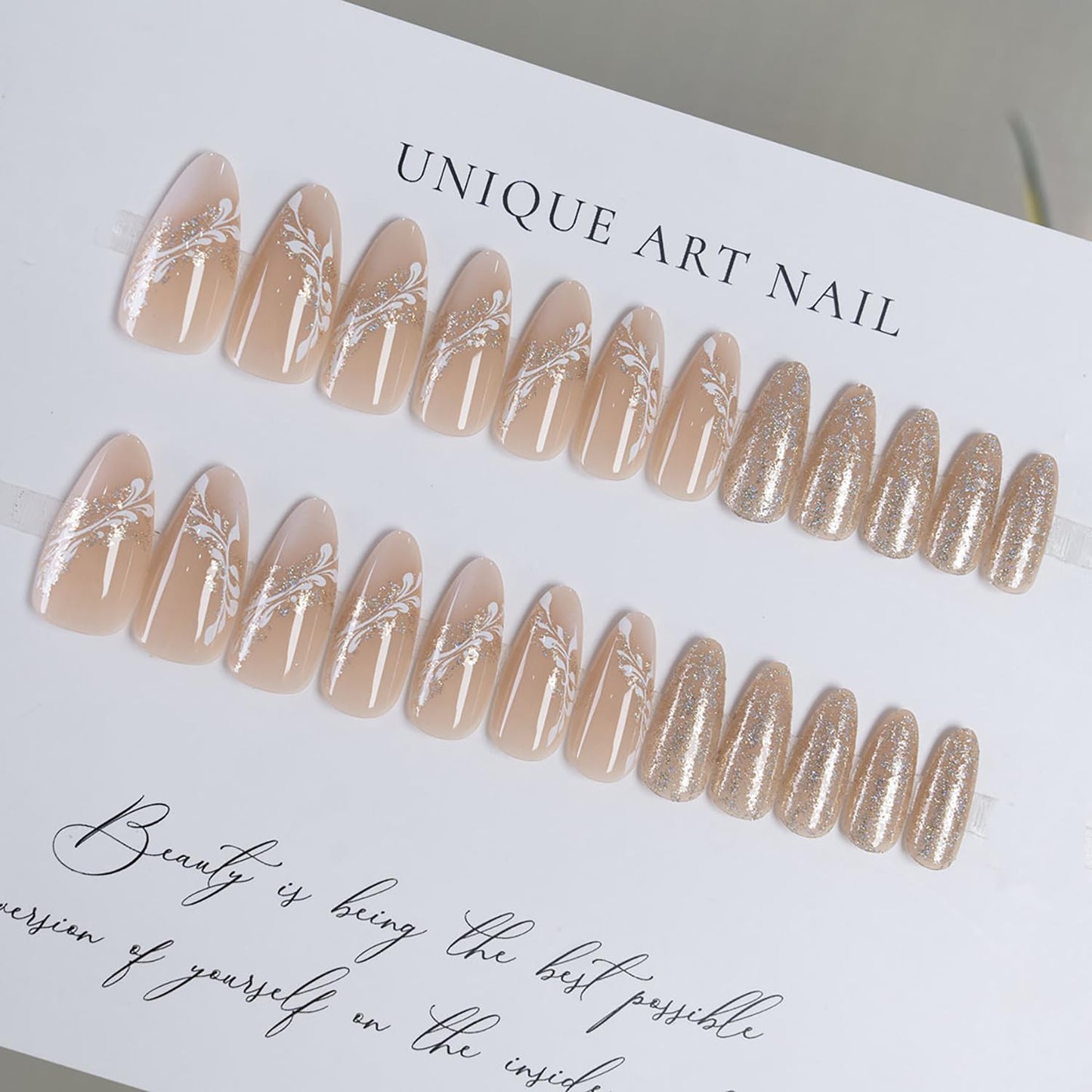 French Tip Press on Nails Medium Almond SWEKKE Fake Nails False Nails with Glitter Leaves Designs Elegant Glossy Glue on Nail Full Cover Nude Acrylic Nails for Women Girls 24Pcs