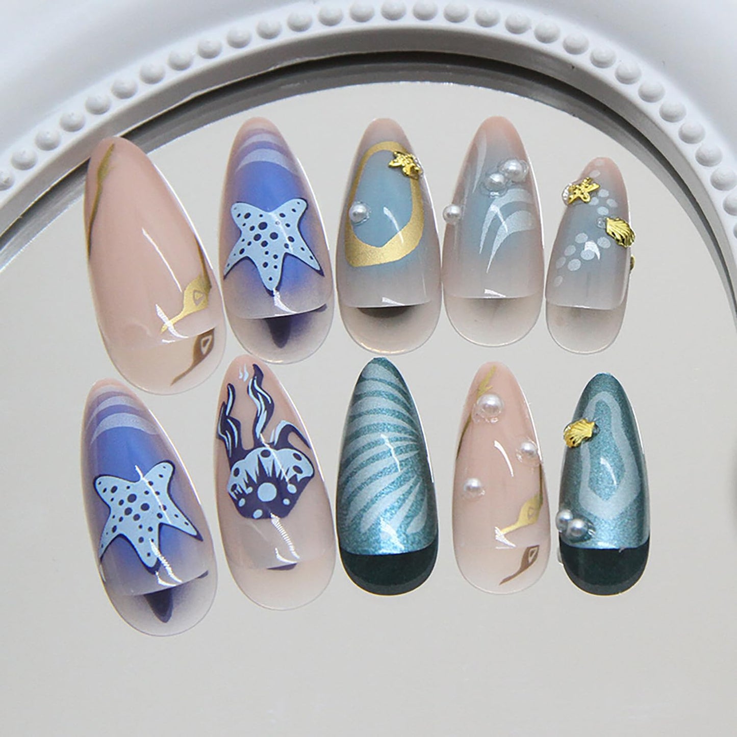 RIICFDD 24 Pcs Medium Press on Nails Almond Shape Fake Nails Blue Nails Press ons Pearl Shell Stick on Nails Starfish Medusa Glue on Nails Full Cover Ocean Theme Acrylic Nails for Women Nail Art