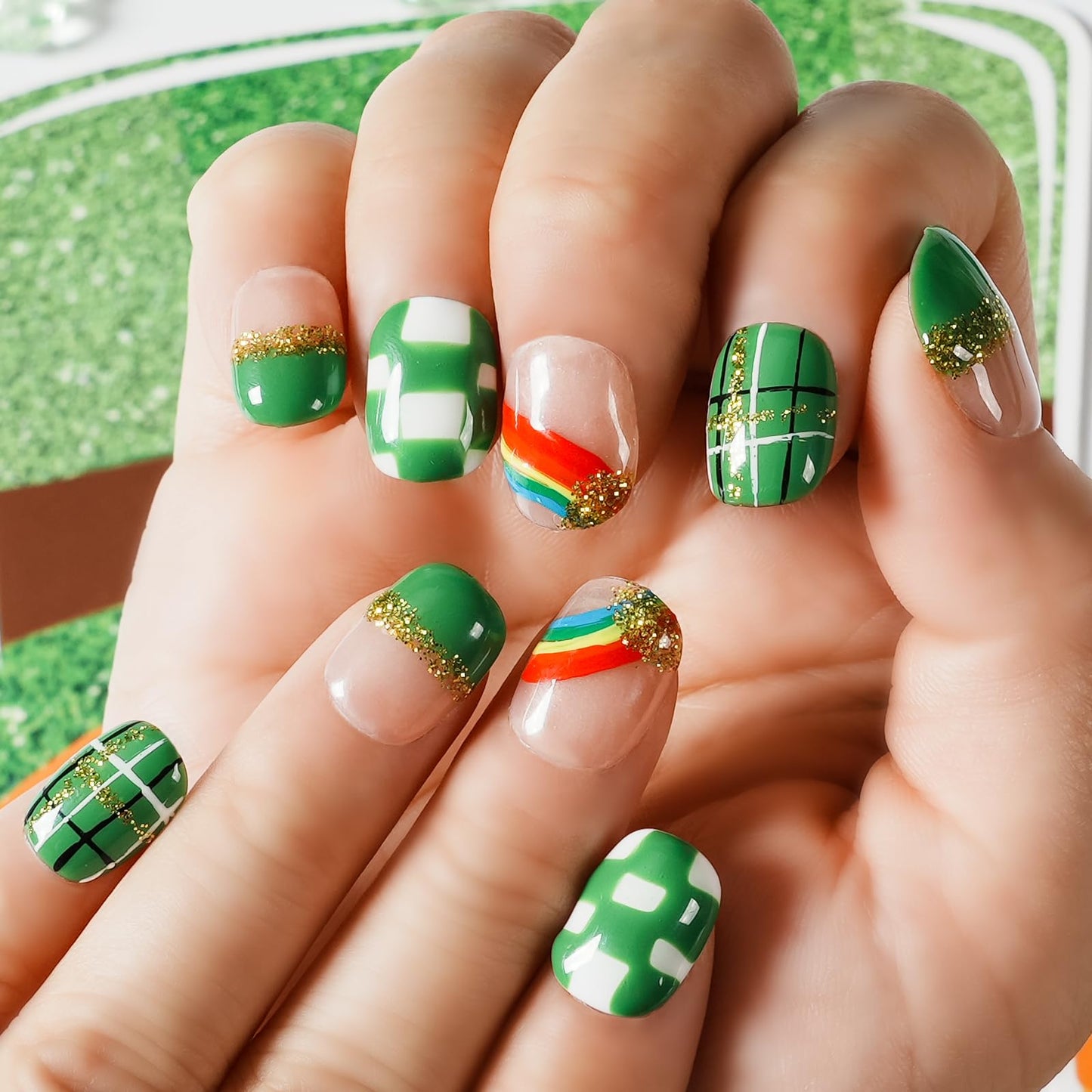 Tesytto Extra Short Press On Nails - Nude Base with Green French Tips & Gold Glitter, Hand-Painted Plaid & Rainbow,Easy to Apply & Remove (Size S)