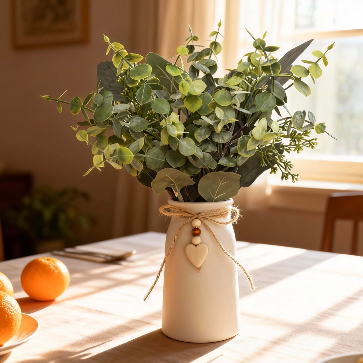 Artificial Silver Dollar Eucalyptus Stems in White Ceramic Vase, 14" Tall Faux Eucalyptus Picks with Twine Bow & Wooden Heart Charm, Full Greenery for Home Decor, Table Centerpiece, Shelf & Office