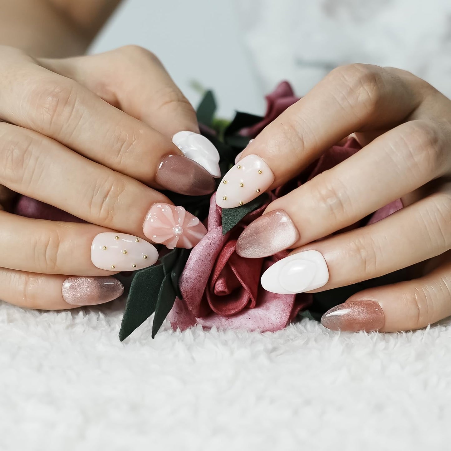 Tesytto Nude Pink Press on Nails Short Almond Cat Eye Fake Nails with 3D Sleek Water Drop Design Glossy Finish Glitter Full Cover Acrylic Nails (Ice Flowers,S)