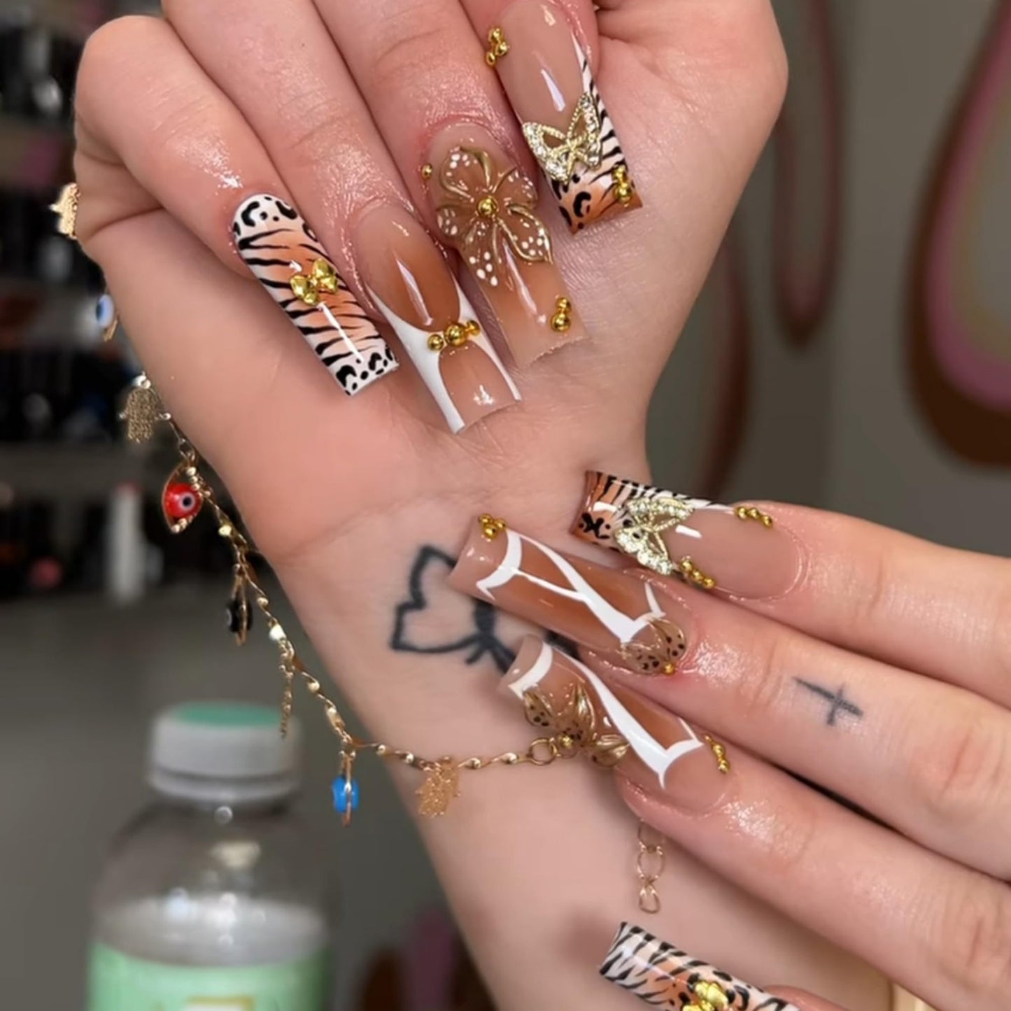 SEENEEY Long Press on Nails Square Fake Nails Brown Artificial Nail Gold Butterfly and Flowers Designs Leopard Stick on Nail for Women 24pcs