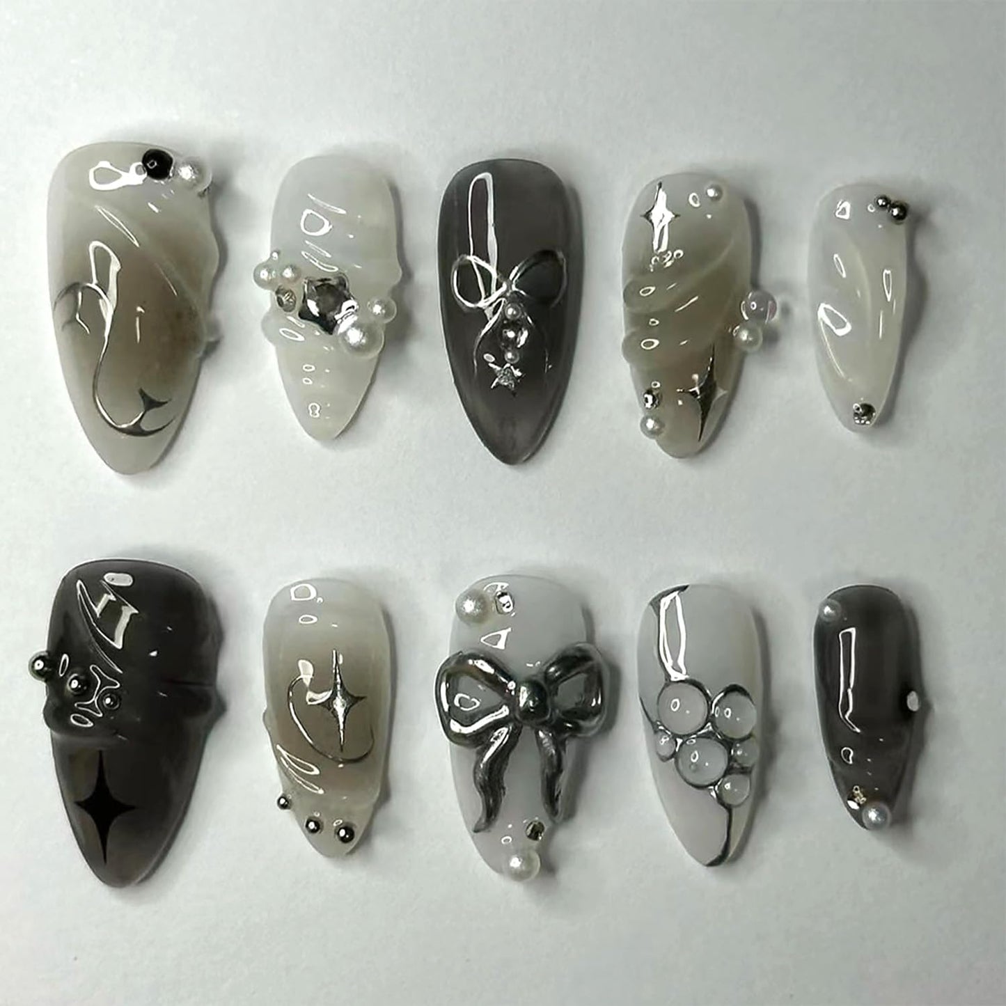 24Pcs Black Bow Press on Nails Medium Almond Fake Nails with 3D Alloy Bow Pearl Designs White Glitter False Nails Full Cover Artificial Glue on Nails Spring Summer Handmade Stick on Nails for Women