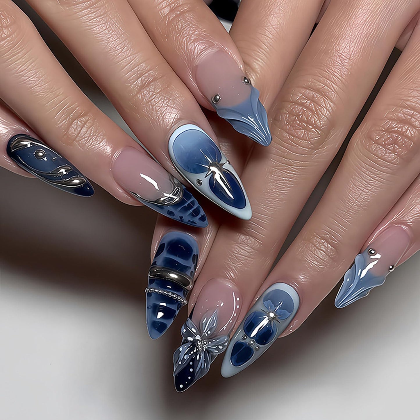 RUOKEXIN Almond Press on Nails French Tip Fake Nails Medium False Nails with 3D Flower Designs Blue Spring Nail Press ons Sparkly Artificial Nails for Women 24Pcs