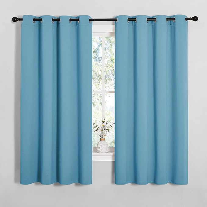 NICETOWN Thermal Insulated Curtains Blackout Draperies, Window Treatment Solid Grommet Room Darkening Drape Panels for Bedroom (Teal Blue, Set of 2, 55 by 68 inches Long)
