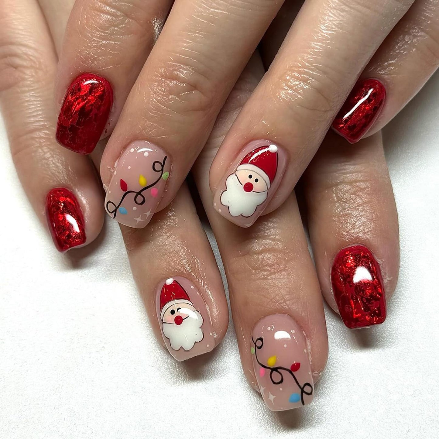 IMSOHOT Press on Nails Short Square Fake Nails Red Shiny False Nails with Santa Pattern Designs Cute Glossy Full Cover Glue on Nails for Women Girls 24Pcs