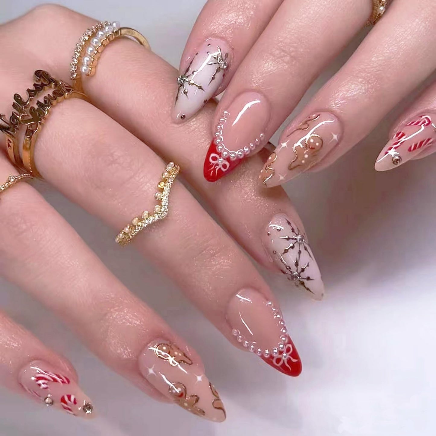 Christmas Almond Press on Nails Medium Fake Nails Red French Artificial Nail with Pearl and Gold Charm Designs Stick on Nail for Women 24pcs