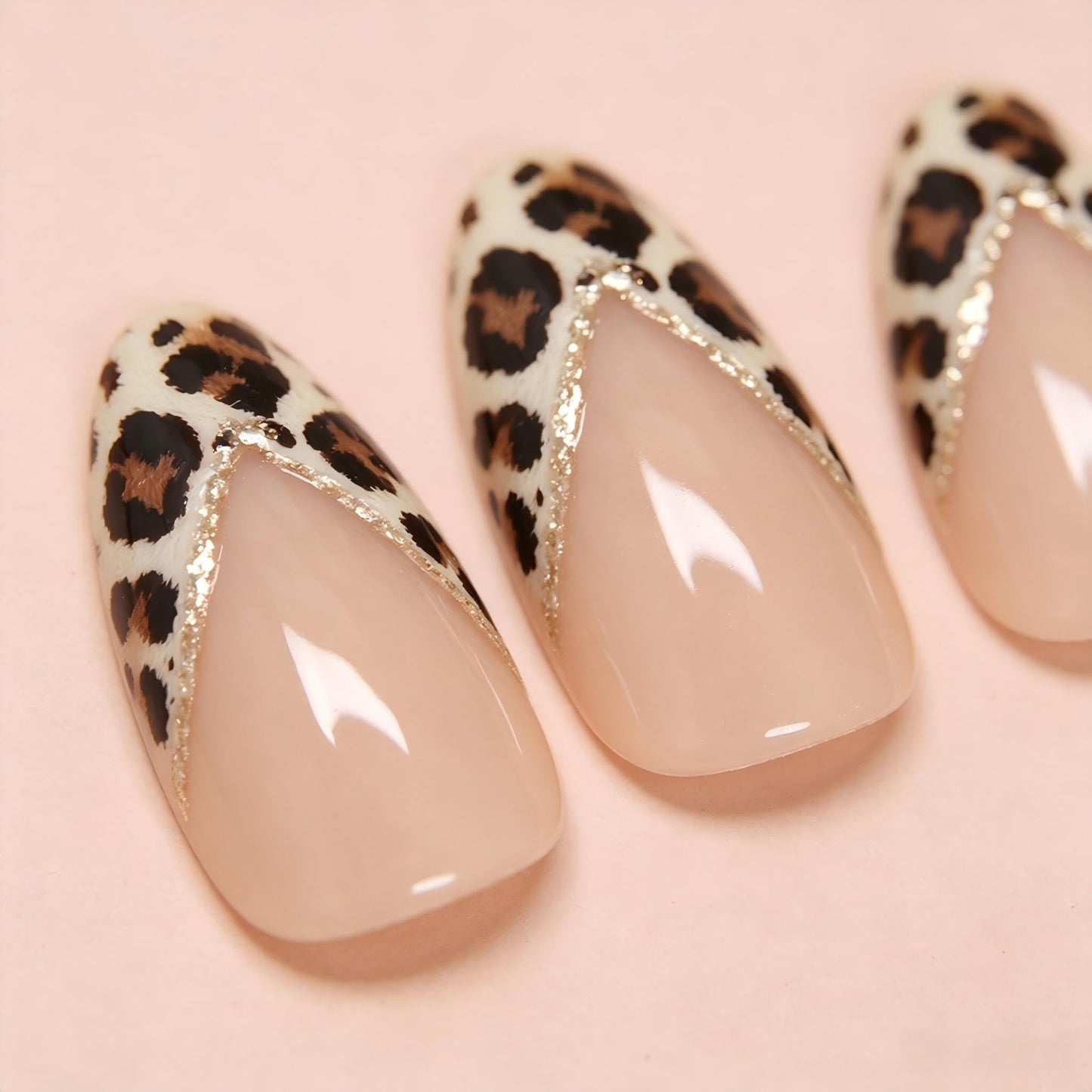 CLYHLTMZ Short Almond French Tips Press on Nails Gold Glitter Striped False Nails with Leopard Print Designs Brown Full Cover Glue on Nails Removable Acrylic Stick on Nails For Women 24 Pcs