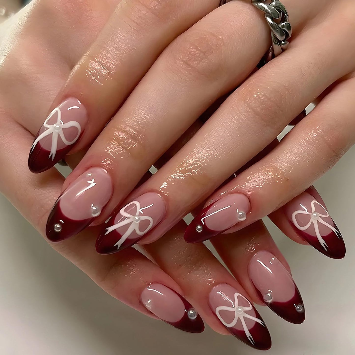 MISUD Press on Nails - Medium Almond Fake Nails with Wine Red French Tip, Acrylic Bow Pearl Design 24 pcs