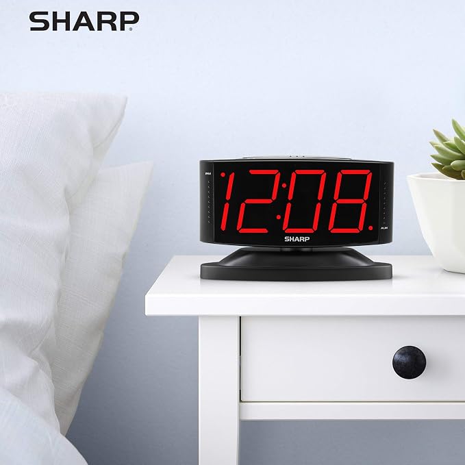 Sharp Outlet-Powered Alarm Clock with Swivel Base, Red LED and Dimmer | Outlet powered; Swivel base; Large red LED digits; Adjustable brightness; Snooze; Simple controls; Midnight Black