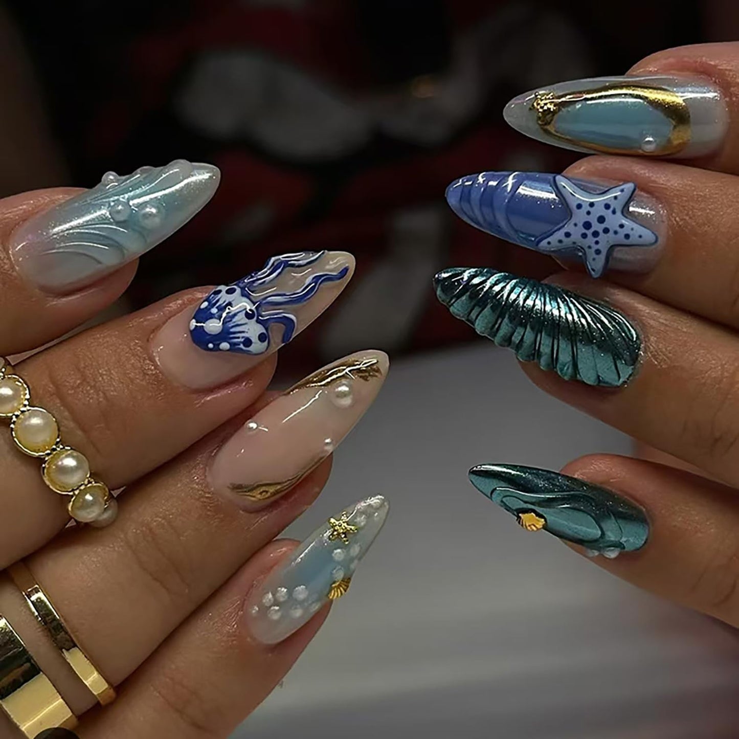 RIICFDD 24 Pcs Medium Press on Nails Almond Shape Fake Nails Blue Nails Press ons Pearl Shell Stick on Nails Starfish Medusa Glue on Nails Full Cover Ocean Theme Acrylic Nails for Women Nail Art
