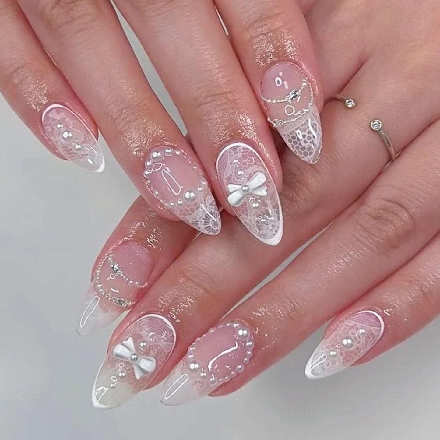 Medium Press on Nails Almond Fake Nails White Translucent Nails Press ons with 3D Bow Pearl Rhinestone Flowers Designs Artificial Stick on Nails for Women 24Pcs